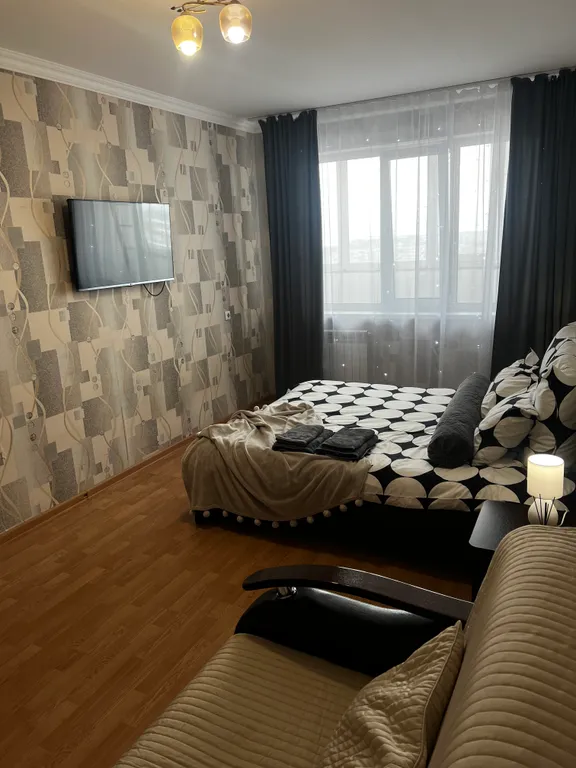 Уютная квартира с видом город и на Волгу