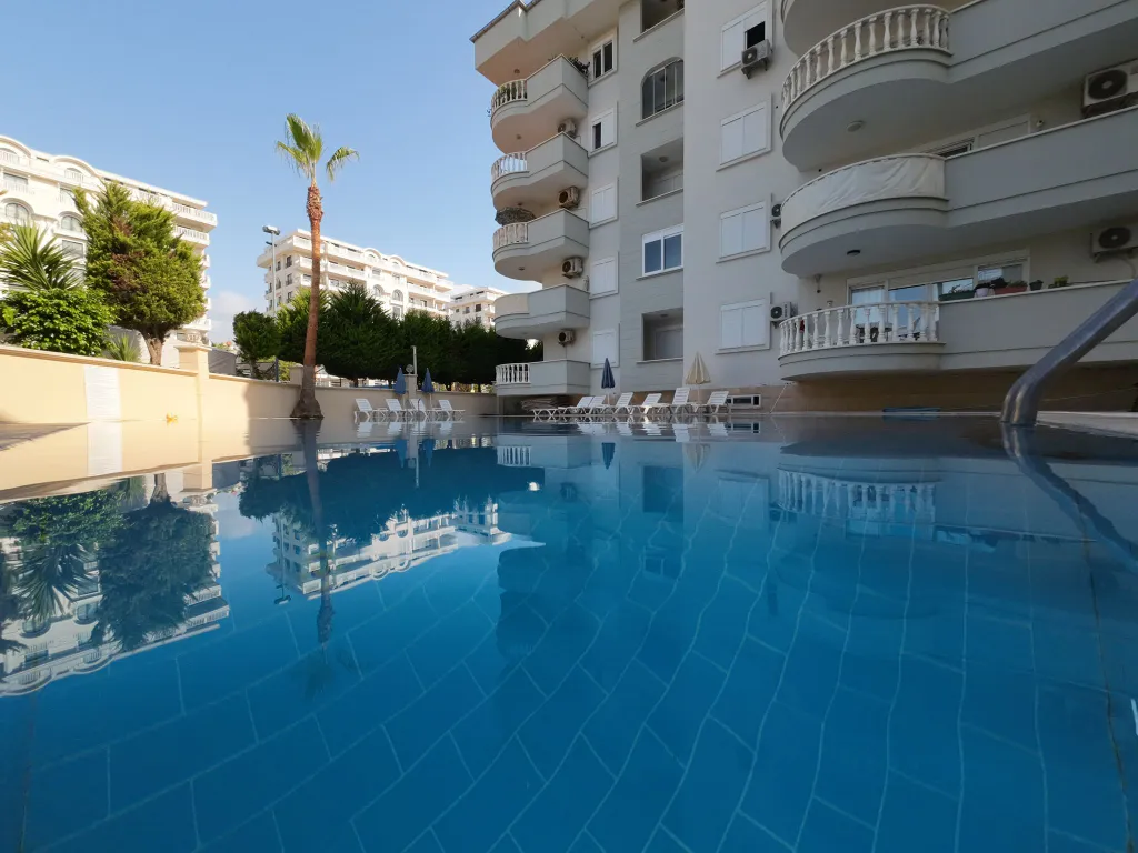 Апартаменты у моря всего в 200 метрах до пляжа с открытым бассейном