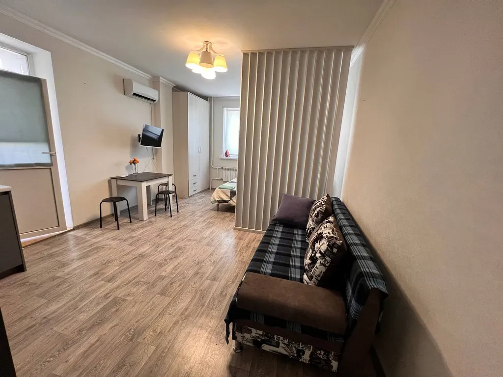 Квартира Уютная светлая студия, центр, ТЦ Вояж, парковка, кафе, аквапарк источник — Тюмень