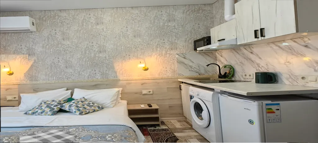 Уютная студия с балконом, отоплением, кухней, стиралкой, беседкой, парковкой