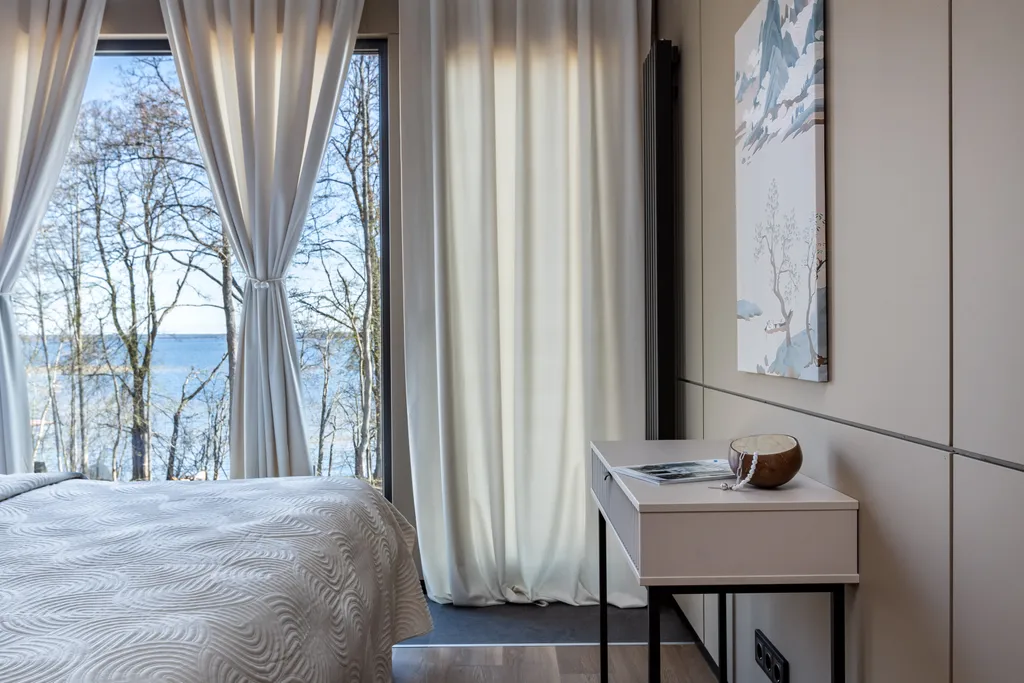 Коттедж на берегу озера с сауной