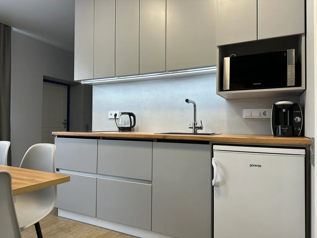 Апартаменты в спальном районе рядом с центром города