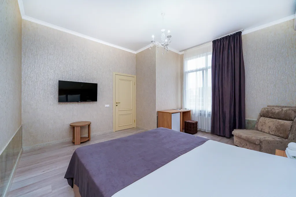 Люкс с балконом и видом на горы