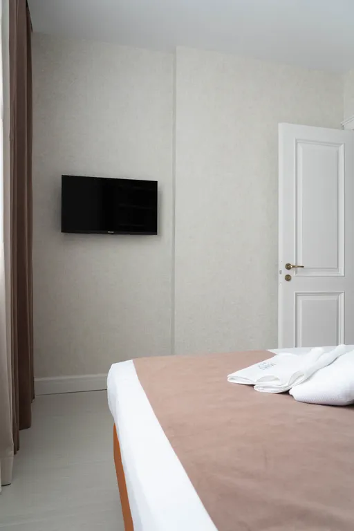 Уютный номер с 2 спальнями и баром, с видом во двор