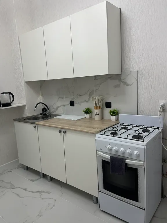 Светлая и уютная квартира с высокими потолками