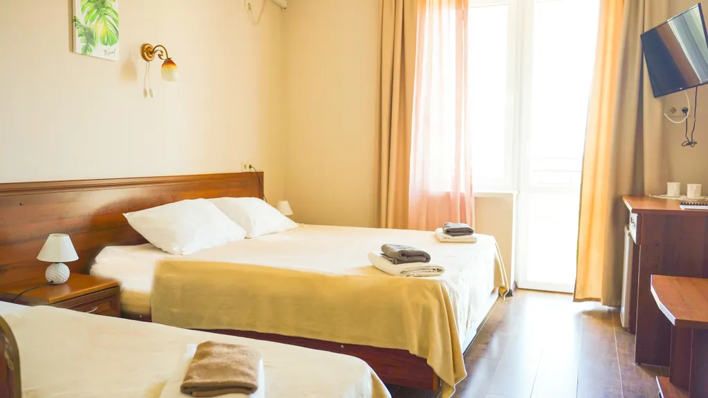 Семейный номер в отеле с бассейном, сауной и питанием