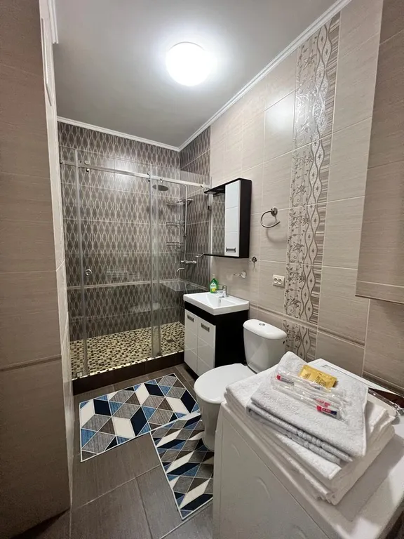 Уютная квартира напротив Алматы Арены