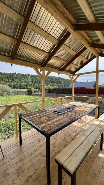 Дом возле реки Караидель на огороженном участке