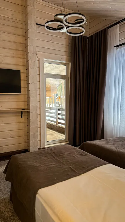 Двухэтажный коттедж в сосновом бору