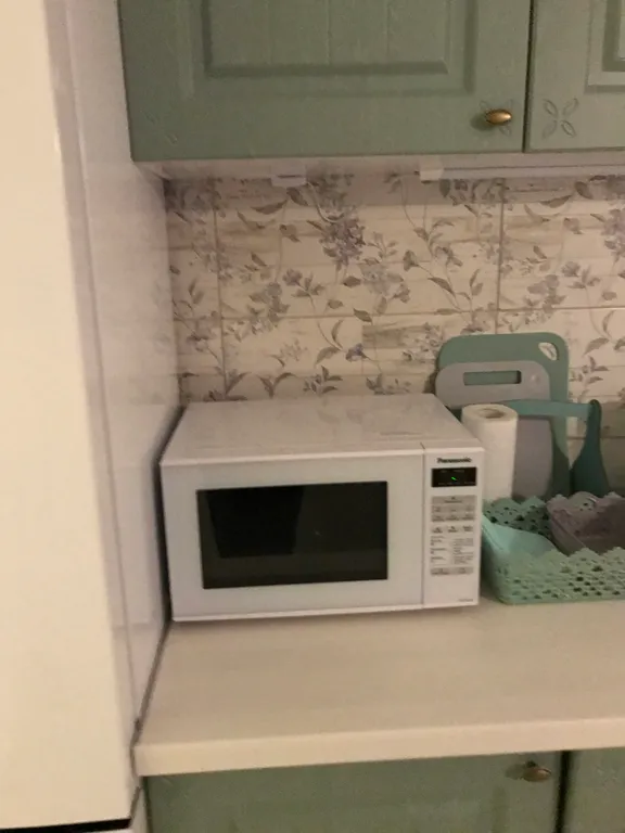 Квартира с зелёной гостиной