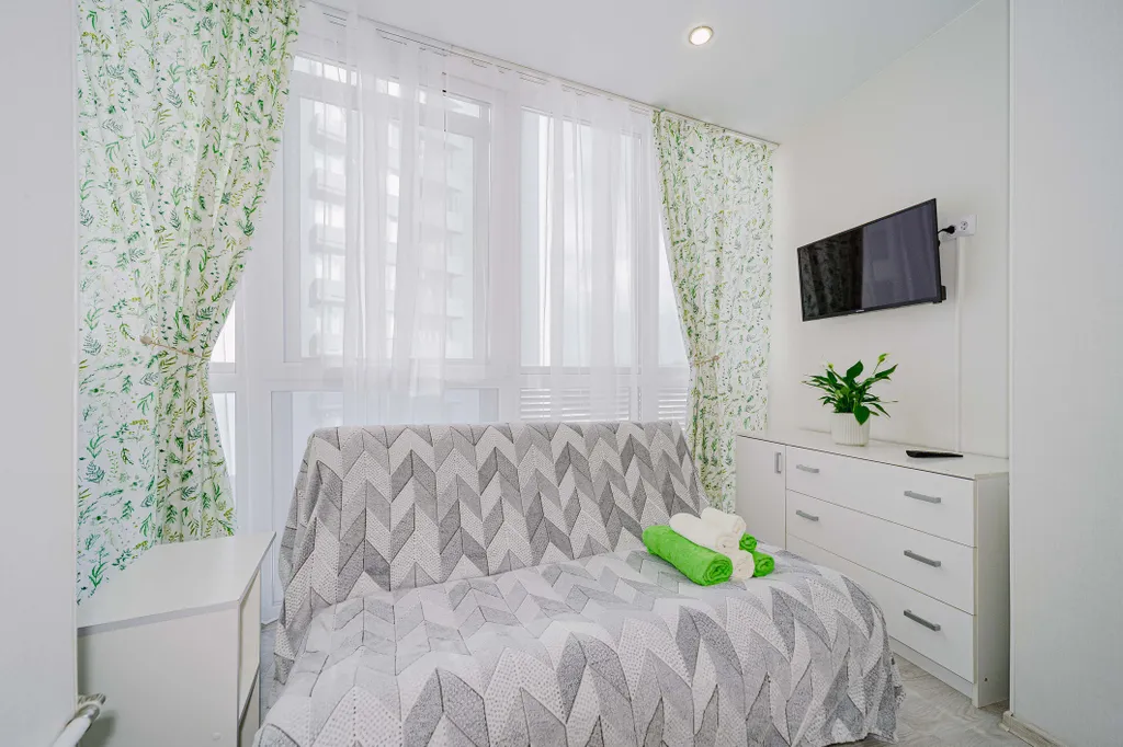 Уютная студия с панорамным окном