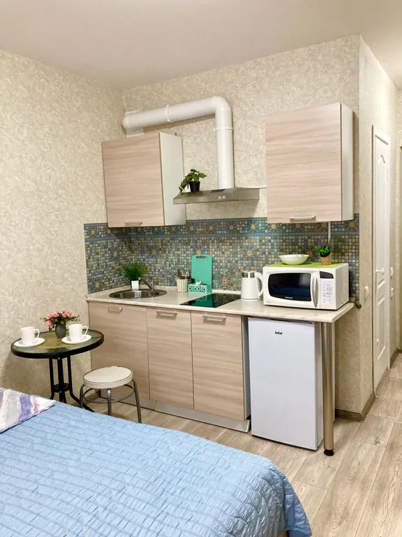 Уютная студия с широкой кроватью