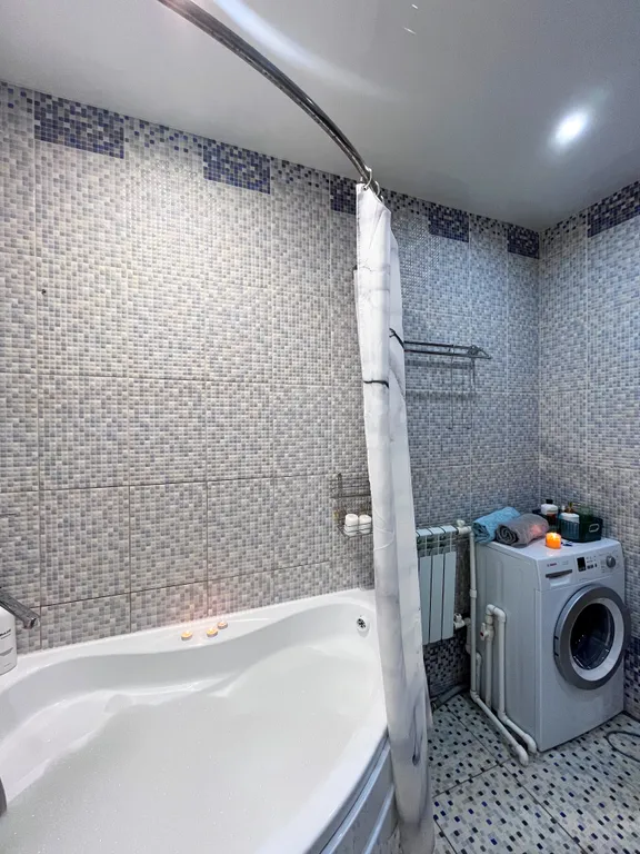 Уютная квартира в 10 минутах езды от центра в новом доме