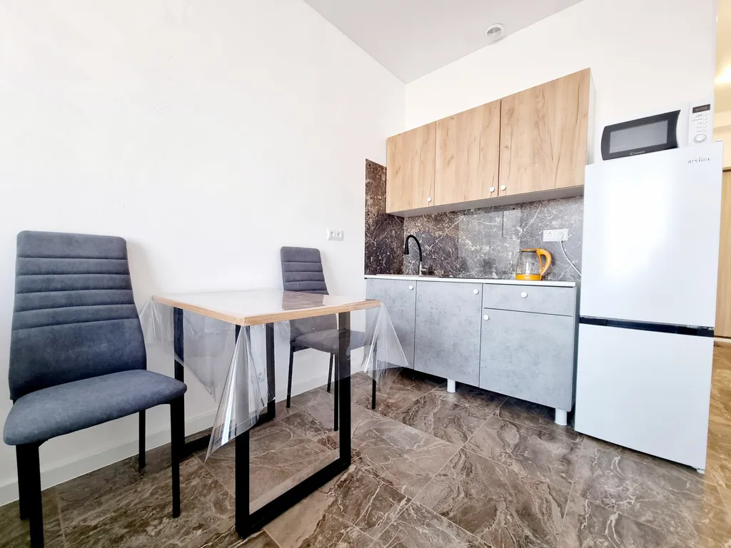 Светлая студия на высоком этаже