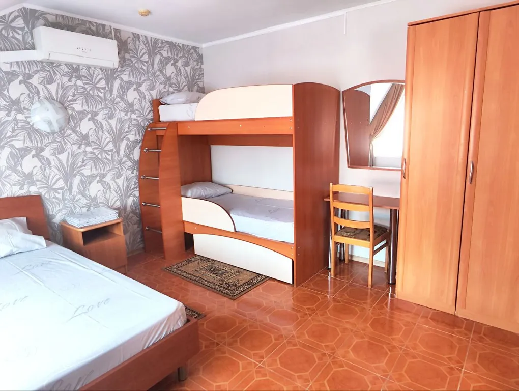 Апартаменты с 1 спальней на мансардном этаже гостевого дома Регион 86