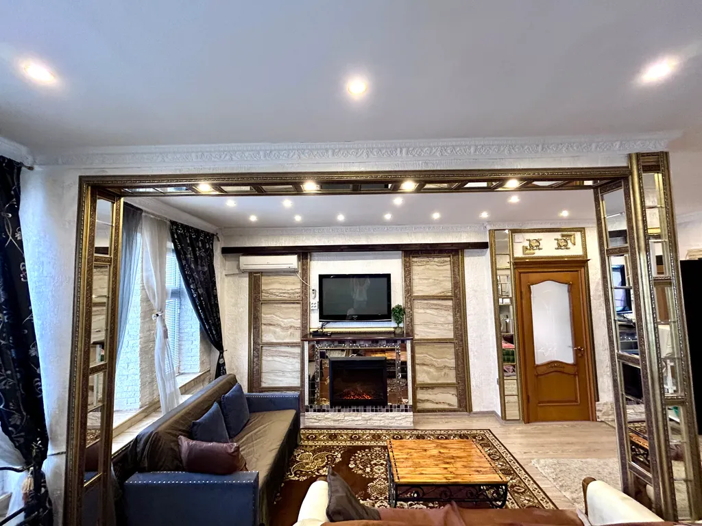 Уютные апартаменты у моря с камином и дизайнерским ремонтом