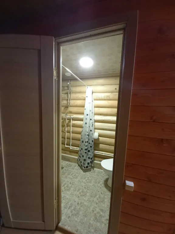 Домик из сосны в городе  С.