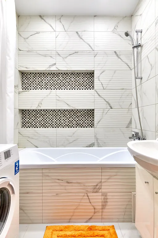 Апартаменты Оранж с диваном в кухне-гостиной