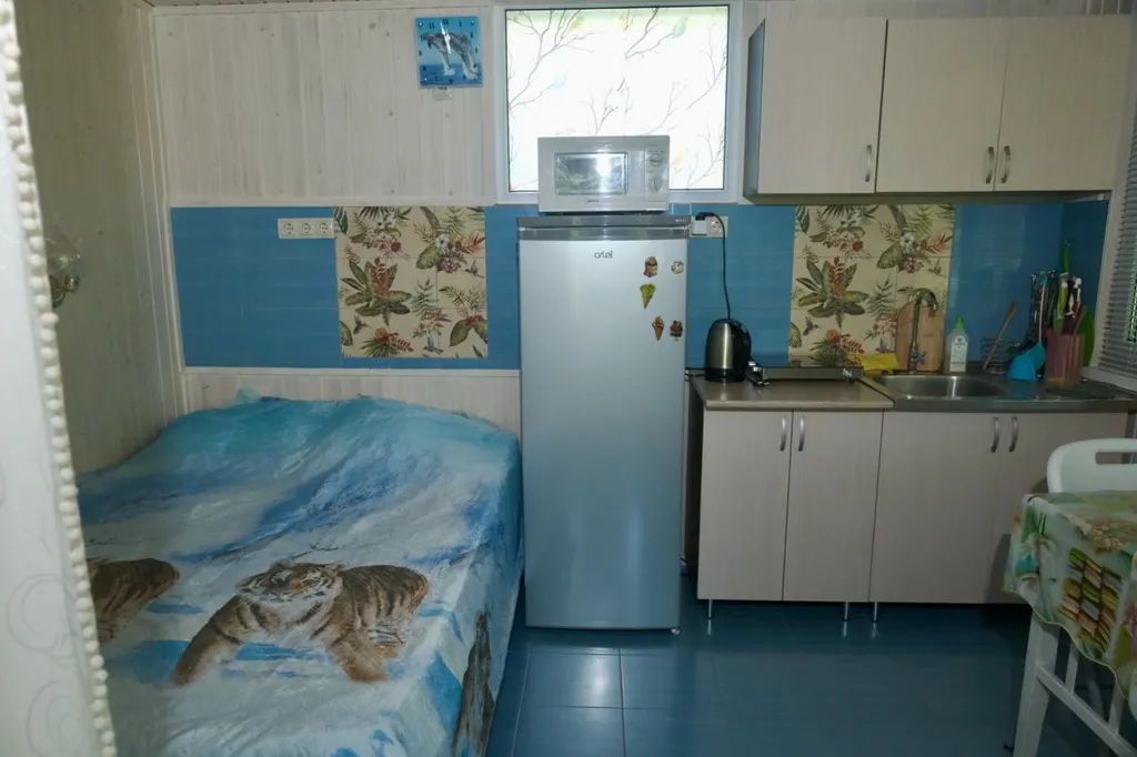 Часть дома с отдельным входом и верандой