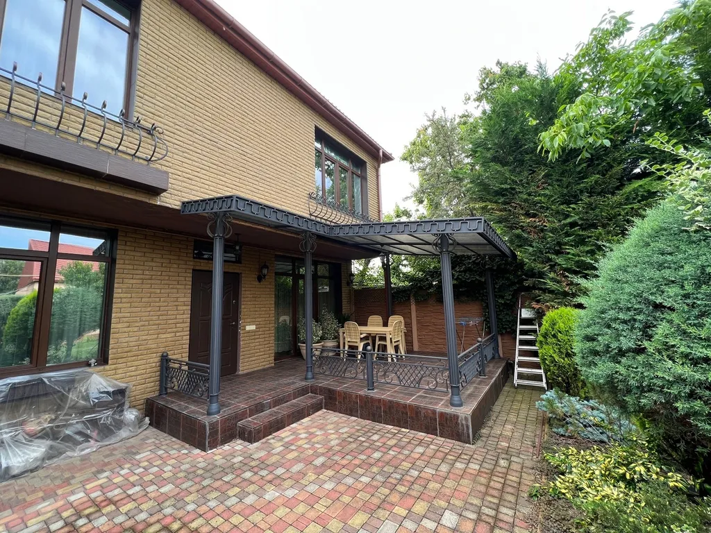 Четырёхкомнатный дом класса люкс в тихом центре