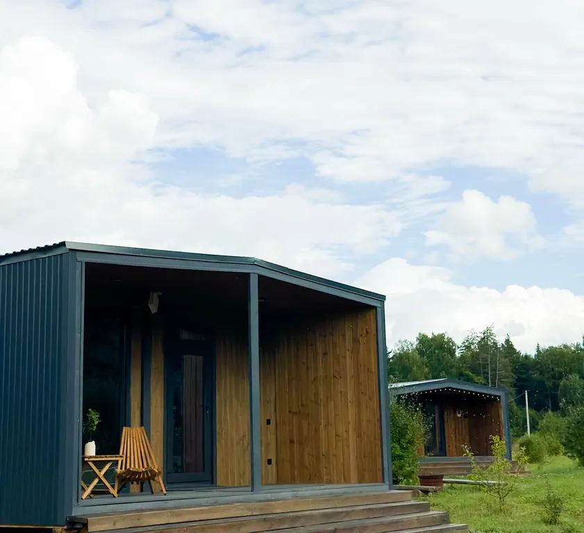 Дом в лесу с сауной в стиле барнхаус