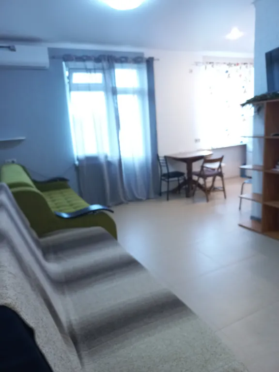 Апартамент с видом на море и горячими источниками