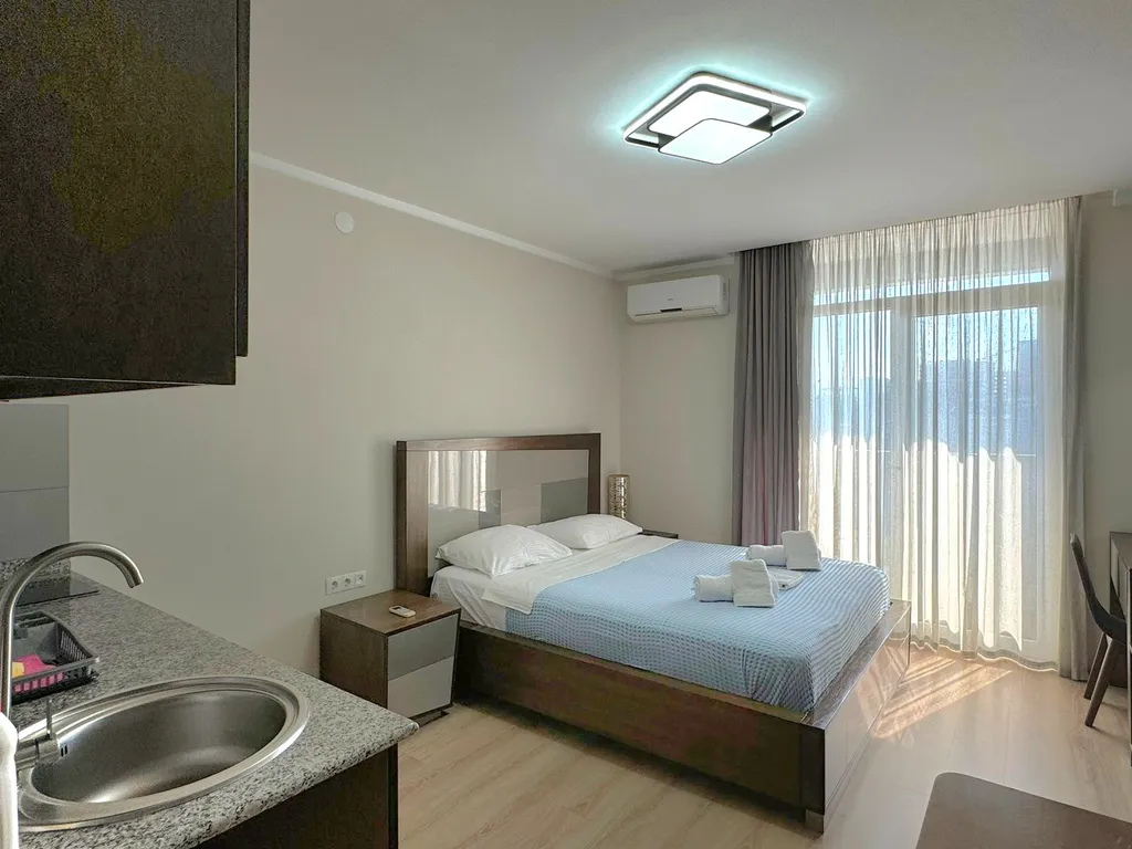 Апартаменты-студия с видом на море и закат