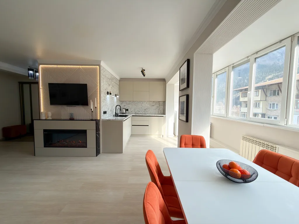 Дизайнерская квартира с видом на горы в центре Домбая