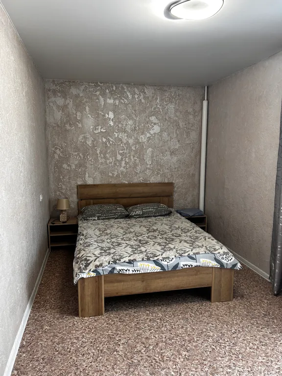 Уютная двухкомнатная квартира в тихом районе с дизайнерским ремонтом