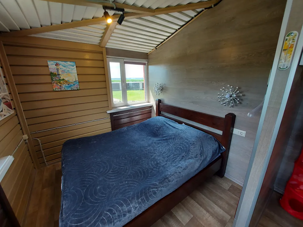 Уютный семейный коттедж с прекрасным видом на озеро Дривяты