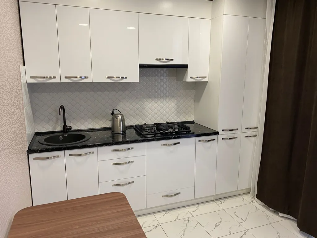 Уютная квартира с современным ремонтом в центре города