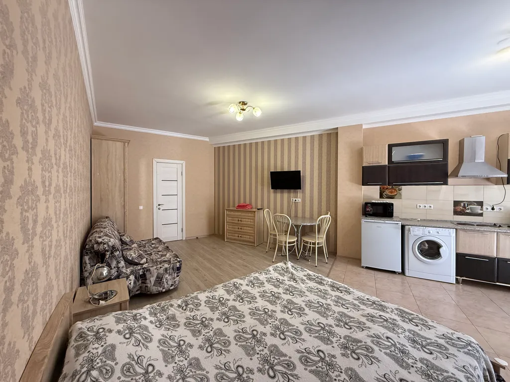 Студия с балконом зоной барбекю у моря