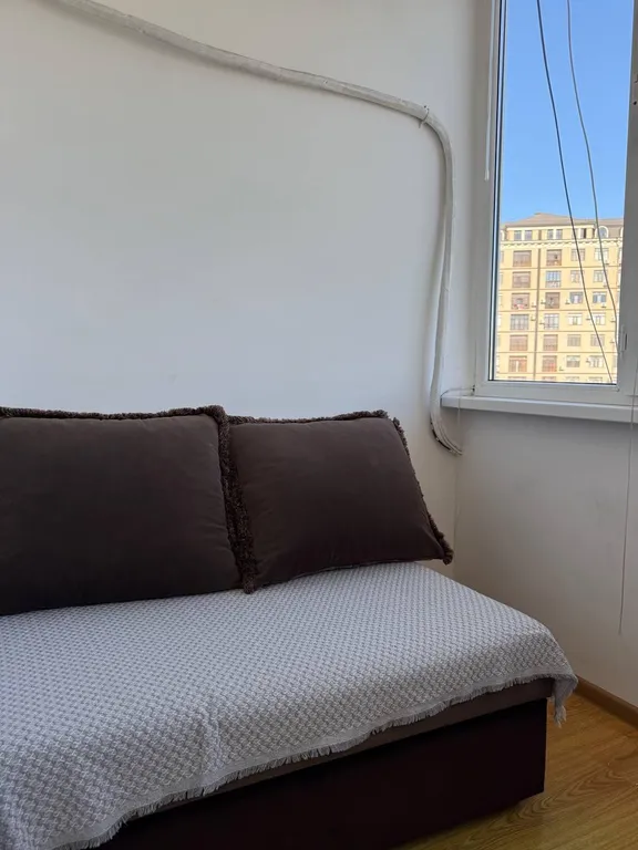 Светлая квартира с балконом и стильной гостиной