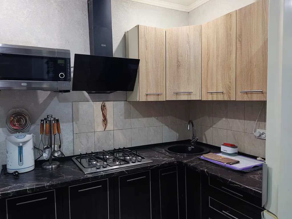 Коттедж с гаражом и двориком