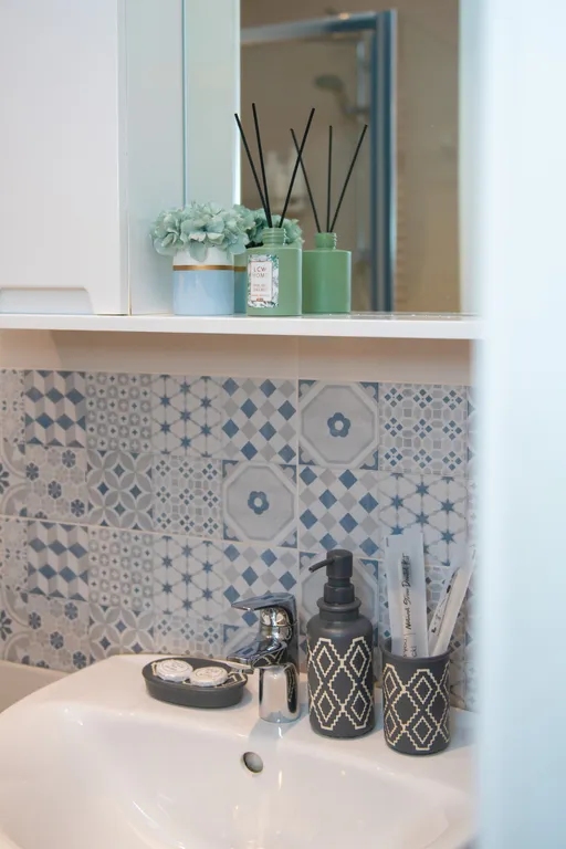 Уютные апартаменты с видом на колесо обозрения и город