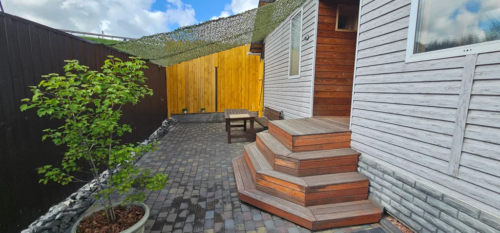 Таунхаус возле города с баней и купелью