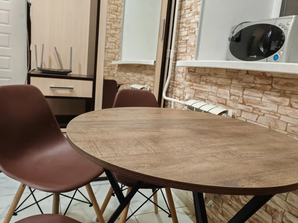 Светлая квартира с большими окнами и высокими потолками