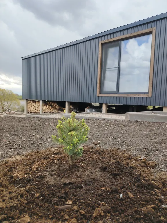 Уютный дом с баней и бассейном на берегу реки Волхов