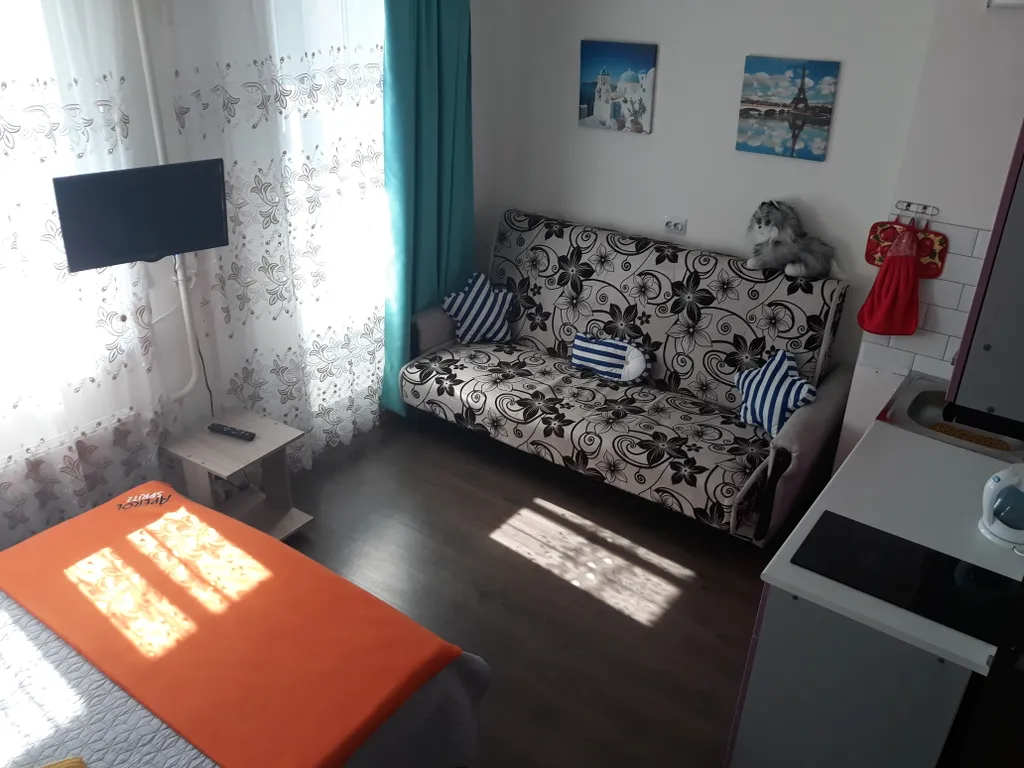 Уютная студия Как дома