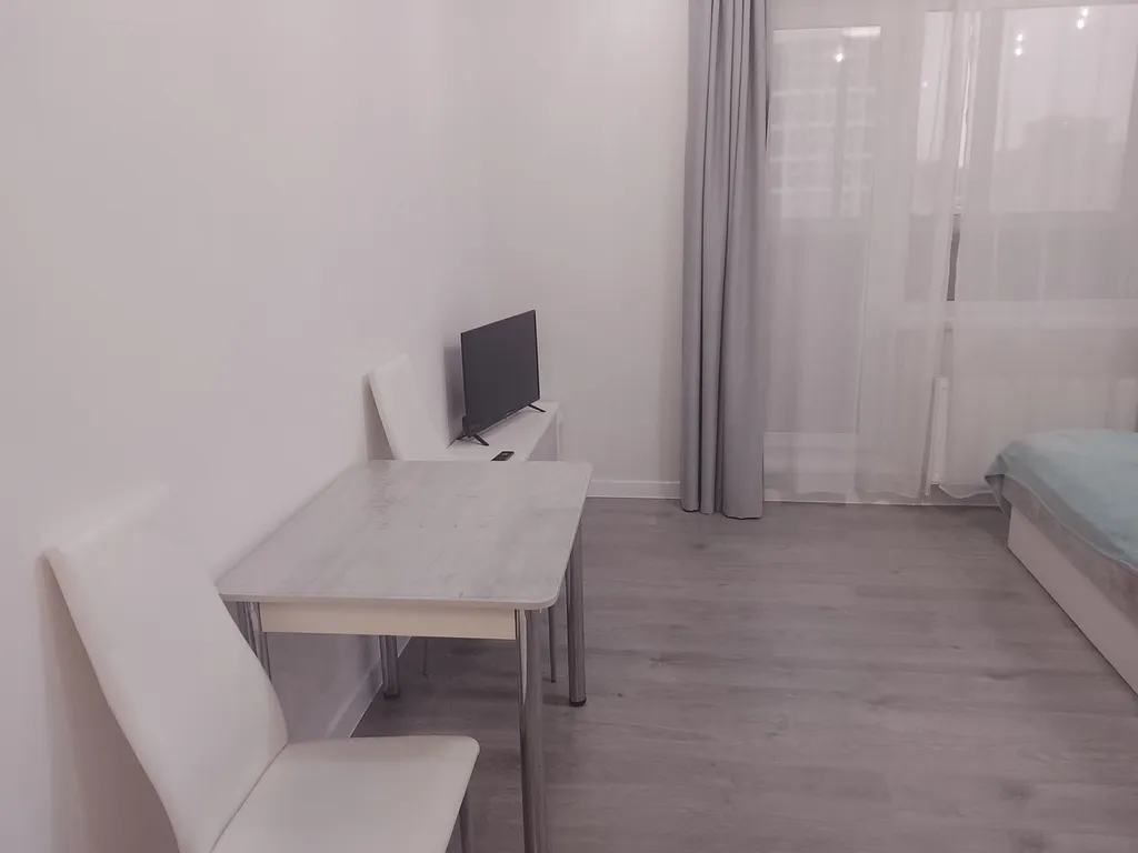 Уютная студия на 19 этаже в новом доме