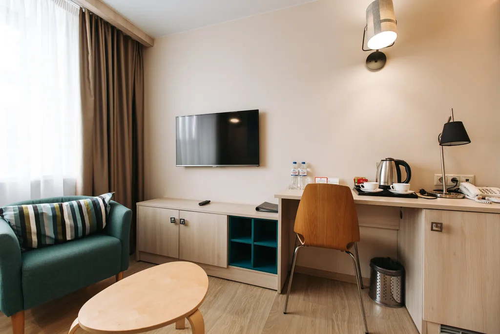 Номер Бизнес с двуспальной кроватью и диваном