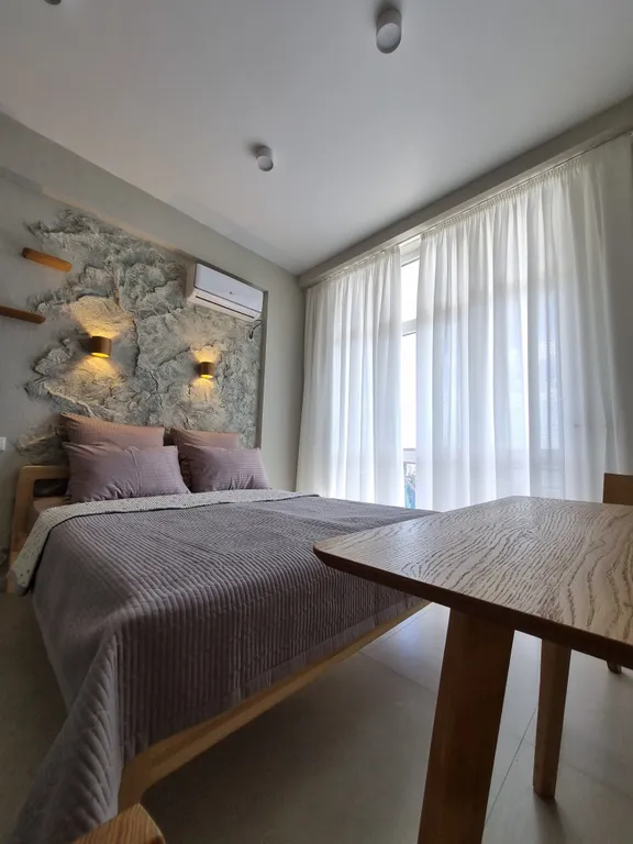 Студия в Ласпи с видом на море