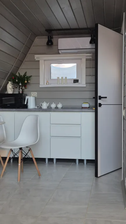 Дом в стиле A frame с чаном