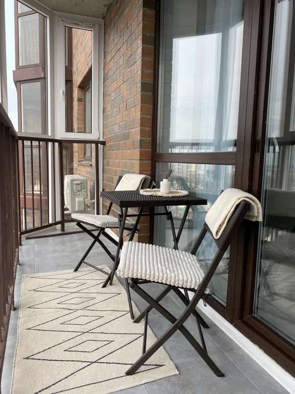 Уютная студия с видом на город