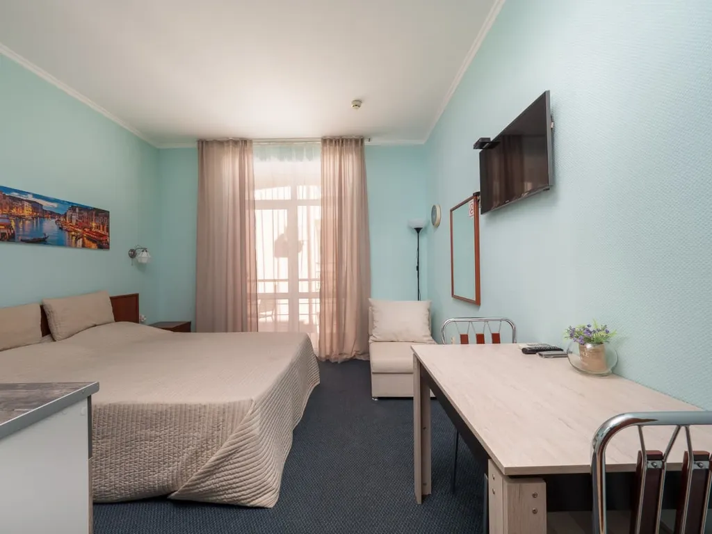 Квартира Квартира Уютная студия у моря с теплым бассейном — Сириус