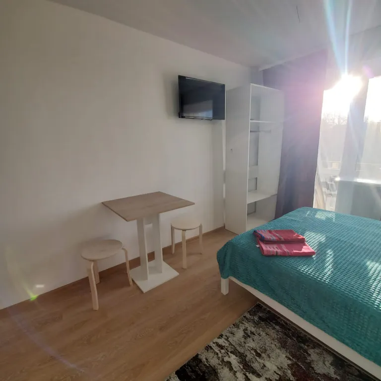 Апартаменты "Как дома" Уютная студия 9