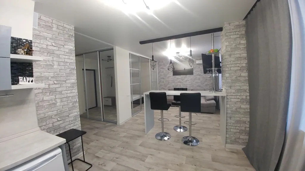 Комфортабельная студия с дизайнерским ремонтом в стиле Лофт