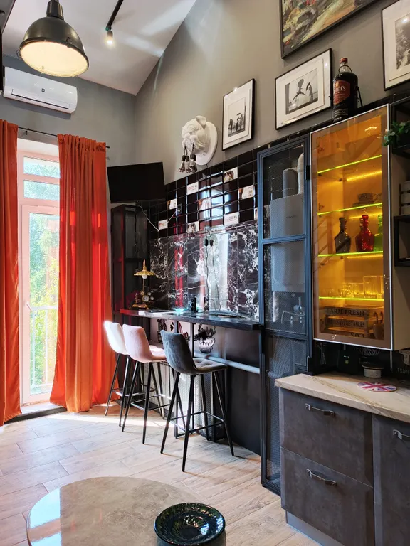 Атмосферная двухуровневая квартира с видом на Петропавловский парк