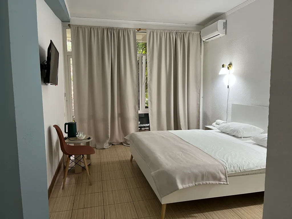 Квартира Квартира Уютный номер на 1 этаже с видом на парк с балконом. — Гагра