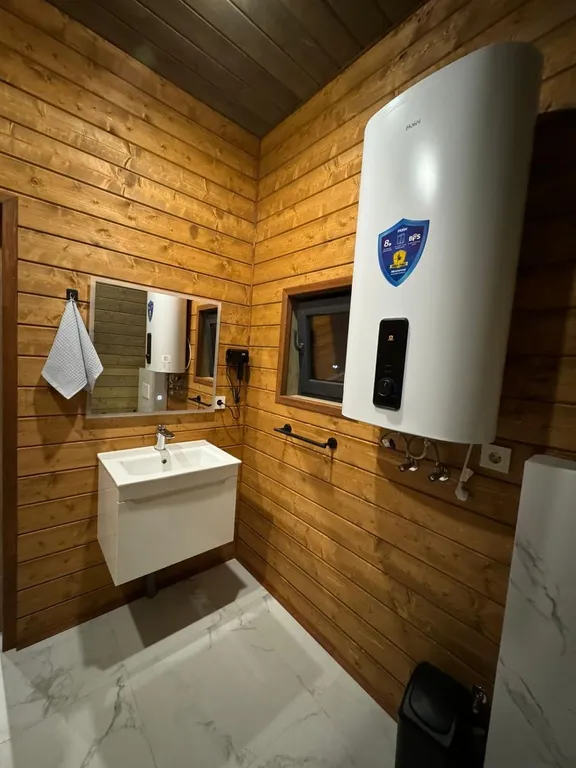 Коттедж в живописной части города с баней, мангалом и беседками